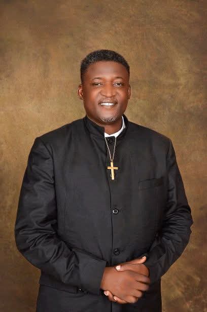 I am not dead----Father David Ayuba cries out.